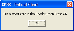 This dialog prompts the user to insert the smart card so that they can proceed.